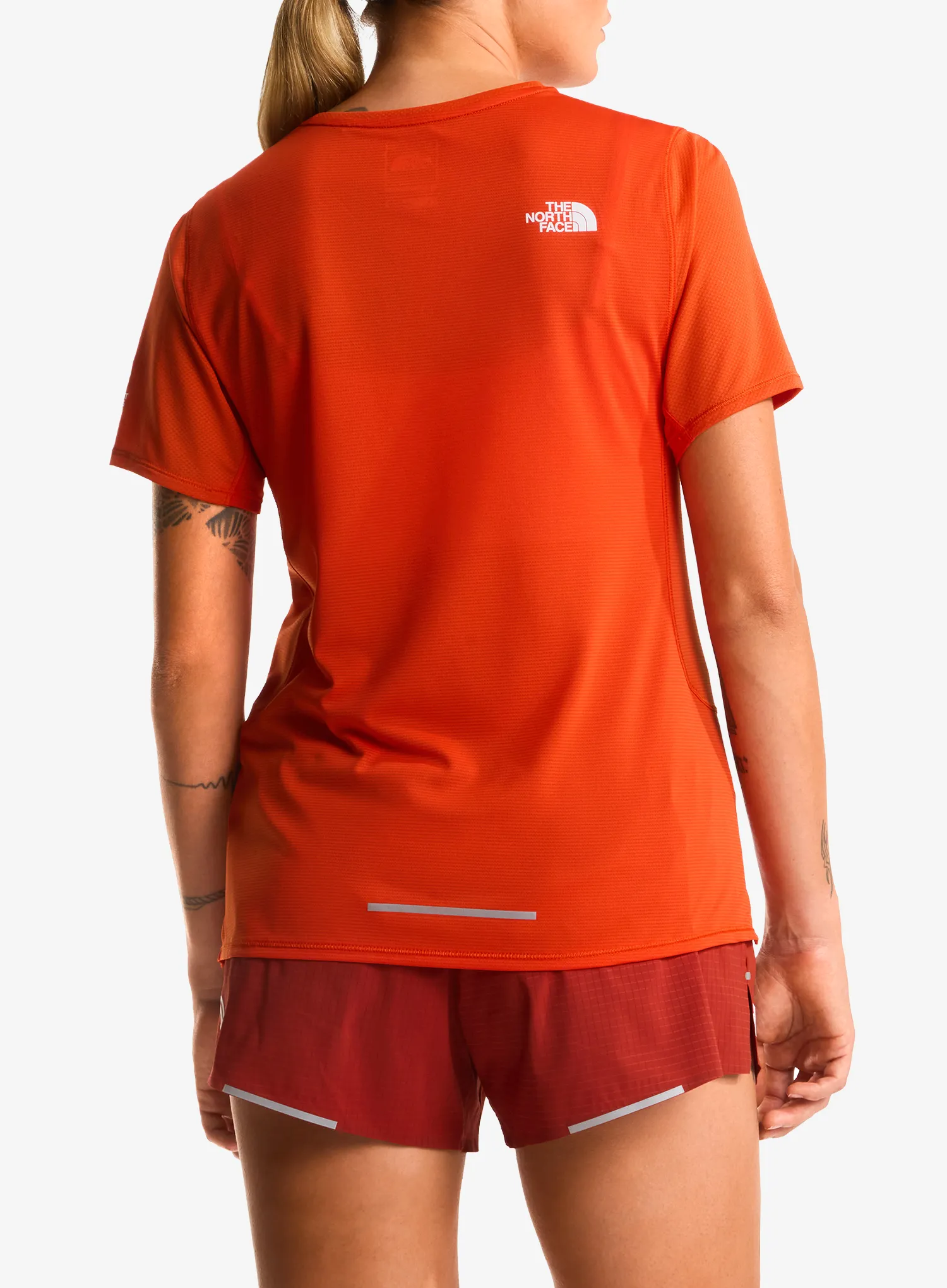 Ženska tekaška majica The North Face Summit High Trail SS - lava red