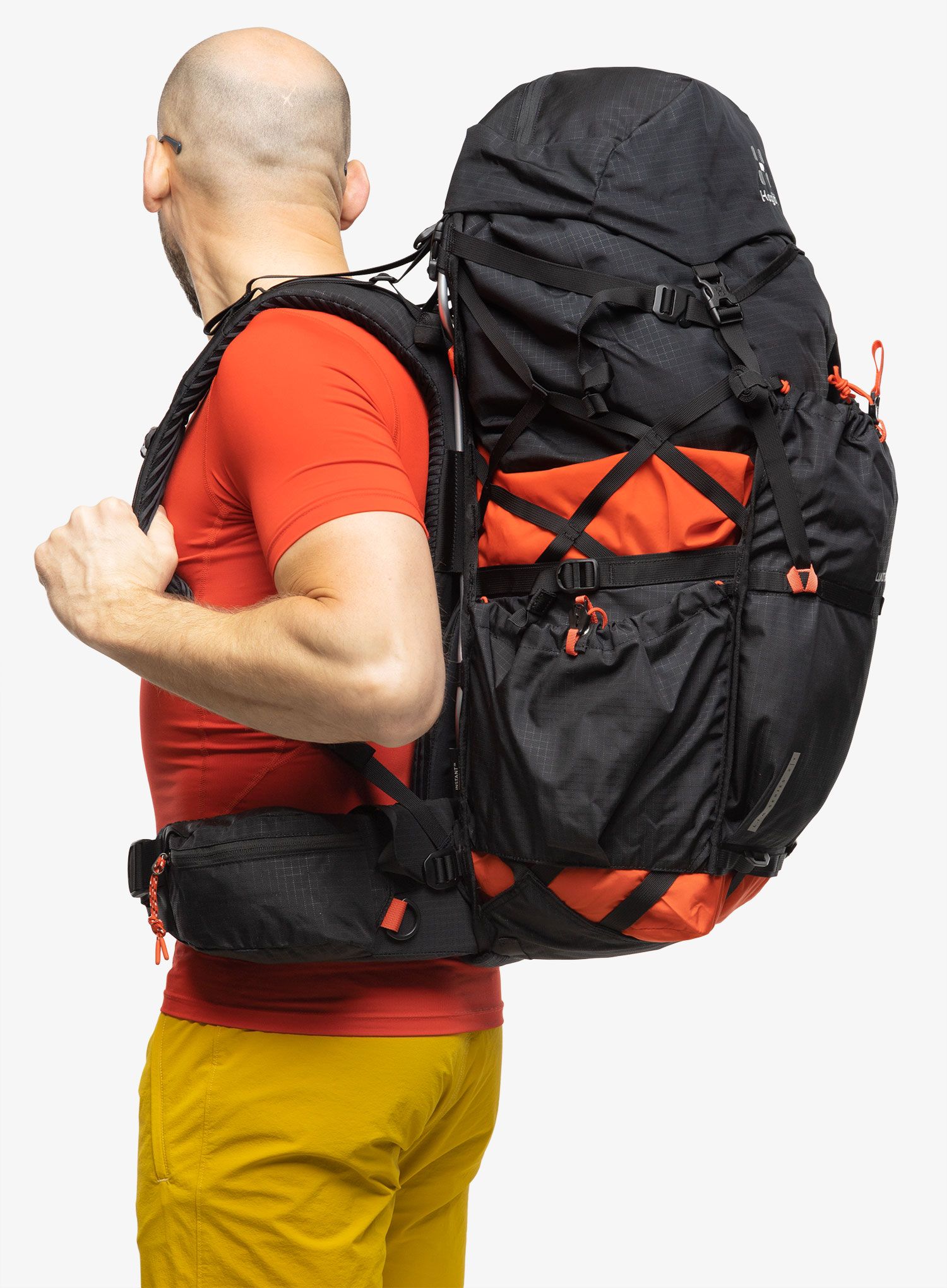 Pohodniški nahrbtnik Haglofs L.I.M ZT 55 - true black/zenith red
