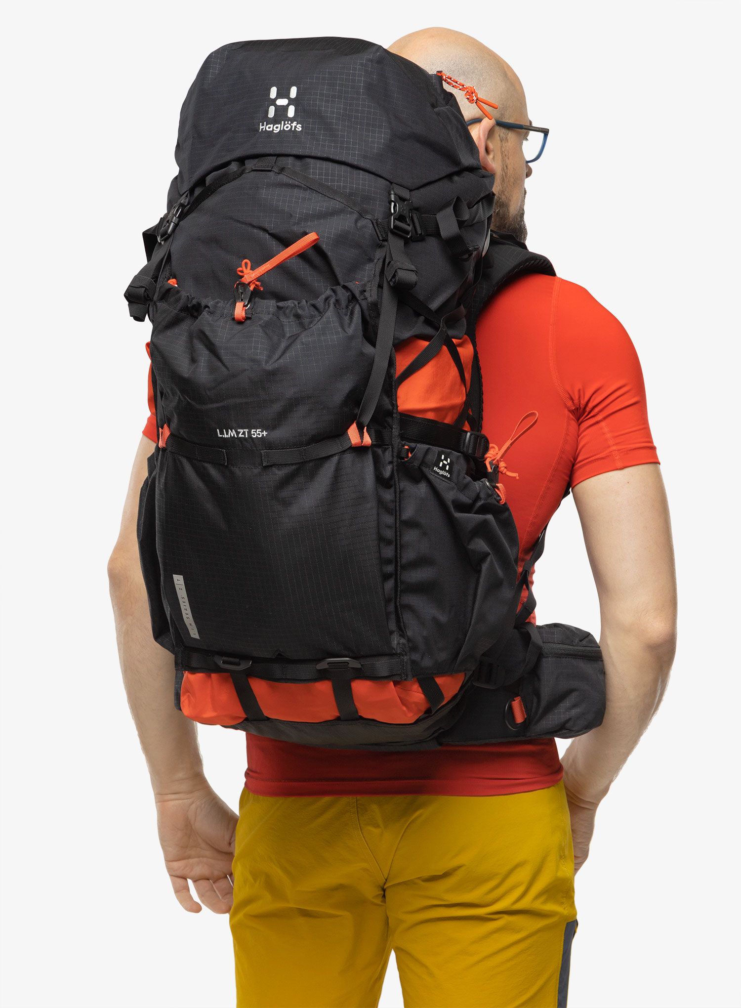 Pohodniški nahrbtnik Haglofs L.I.M ZT 55 - true black/zenith red