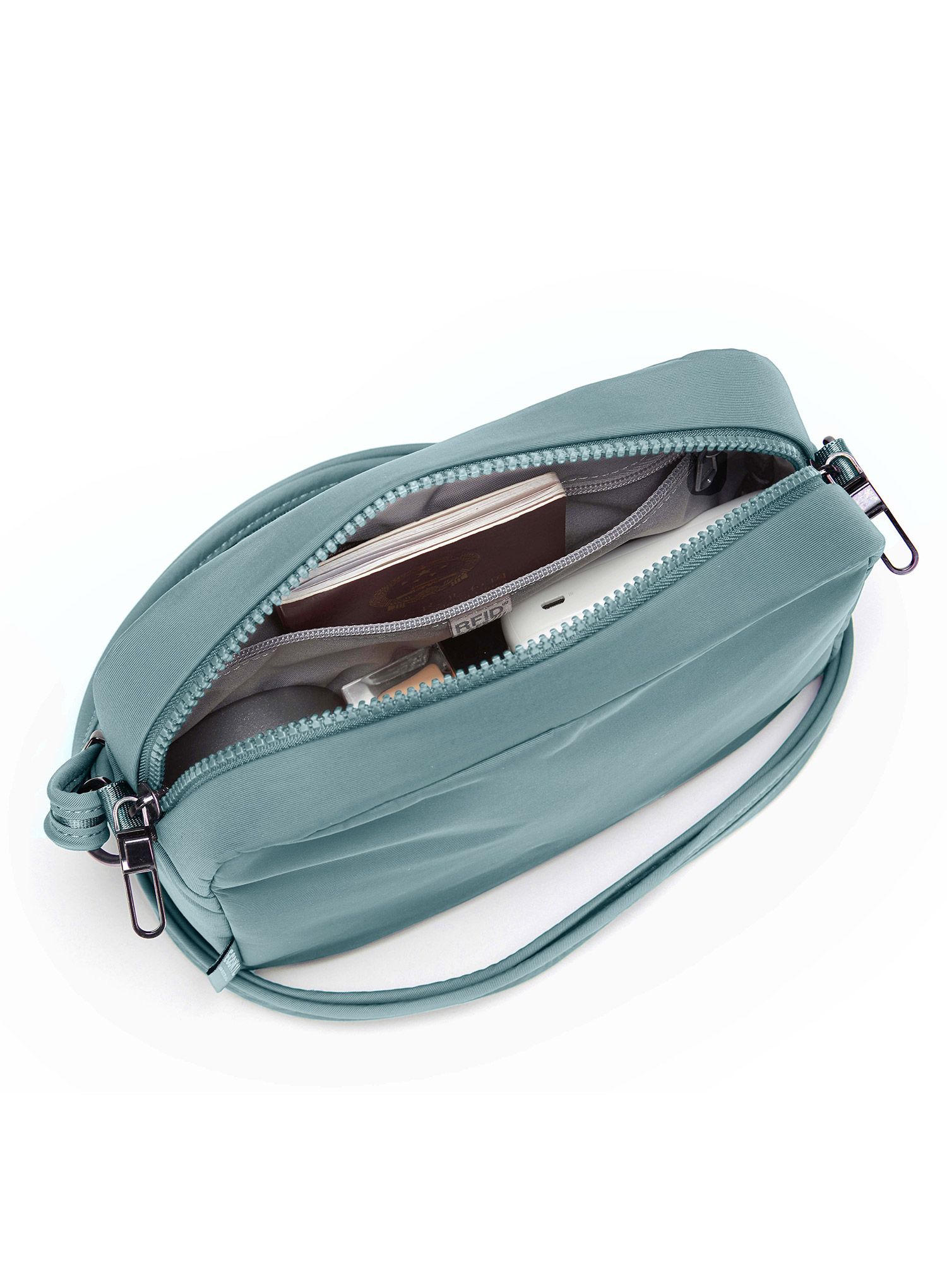 Torbica za čez ramo Pacsafe CX Square Crossbody - fresh mint