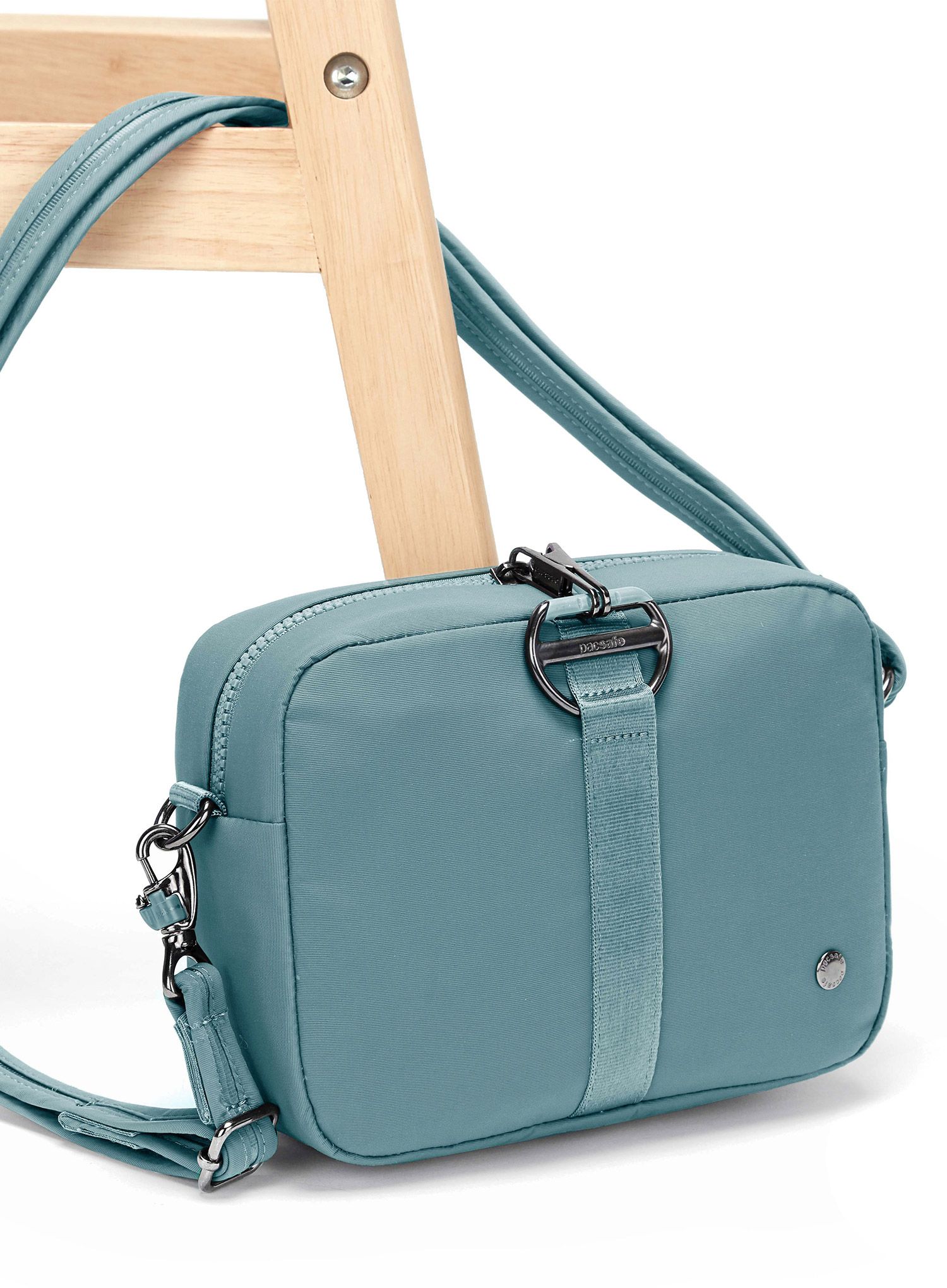 Torbica za čez ramo Pacsafe CX Square Crossbody - fresh mint