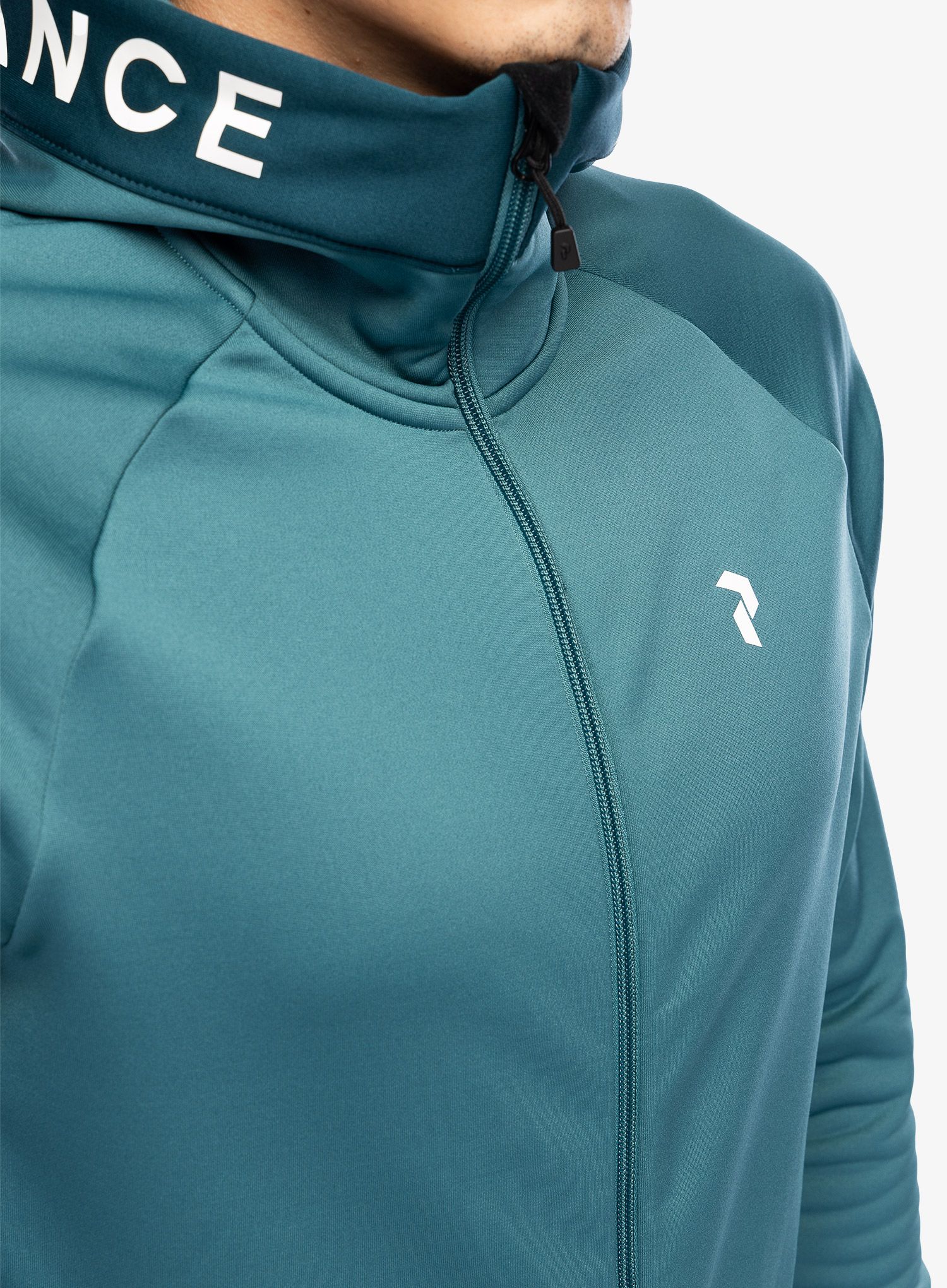 Jopica s kapuco Peak Performance Rider Zip Hood - hydro fresh/infinity teel