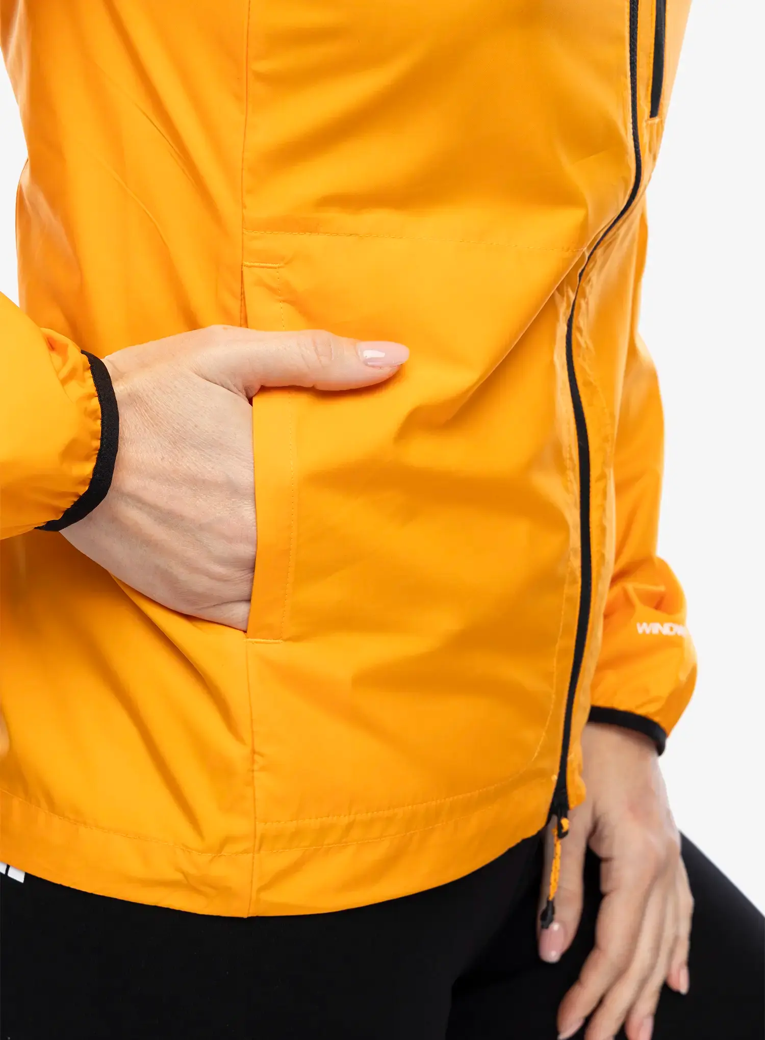 Ženska vetrovka The North Face Higher Run Wind Jacket - apricot glaze/iron citrus