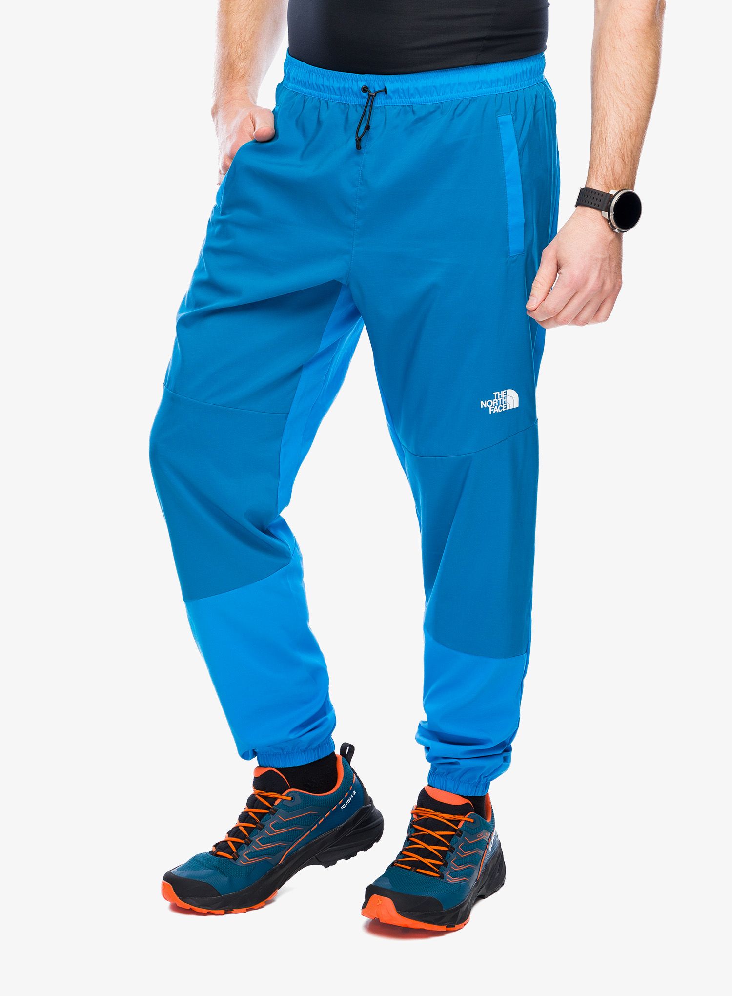 Pohodniške hlače The North Face Ma Wind Track Pant - skyline blue/adriatic