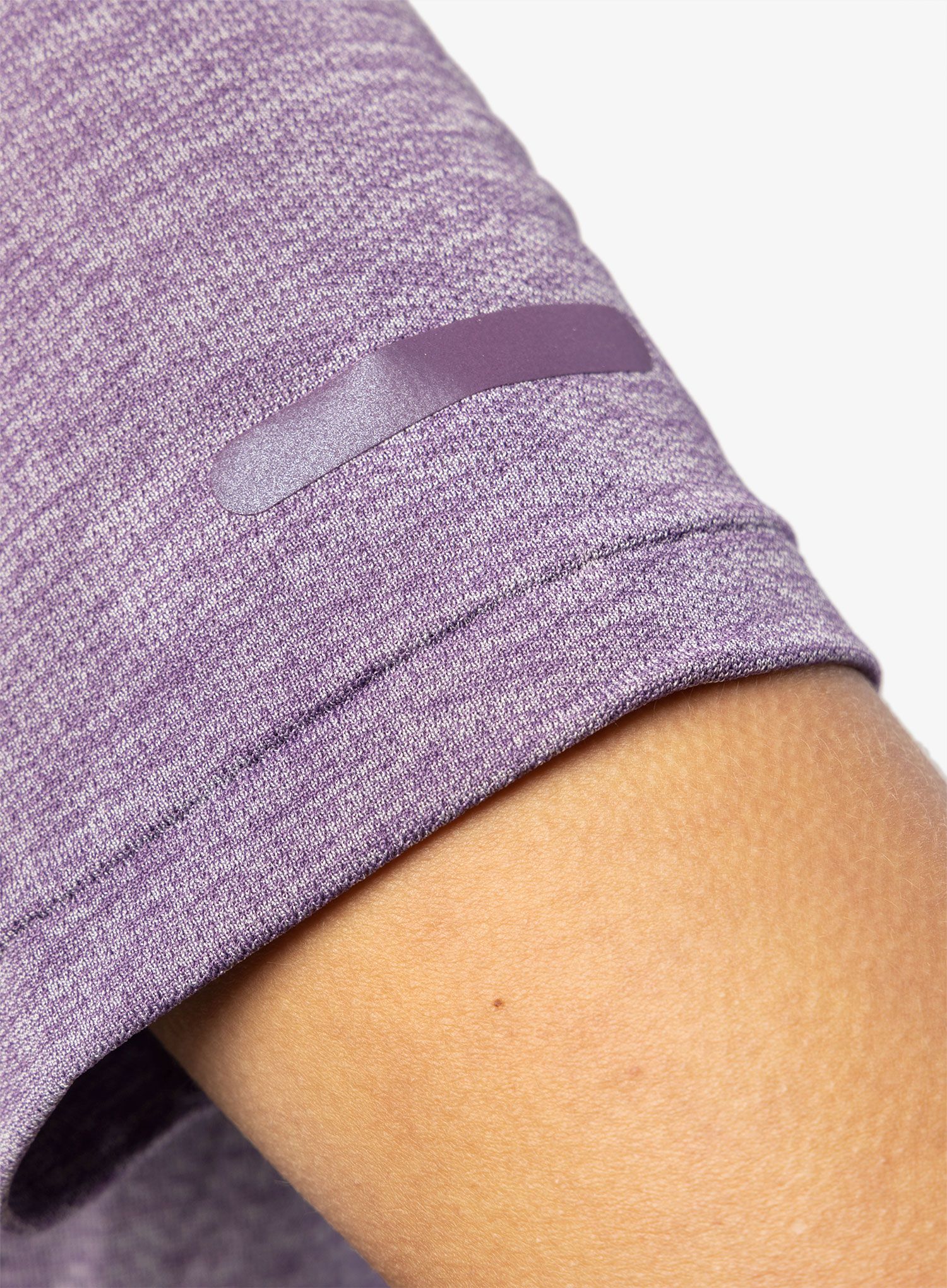 Ženska tekaška majica Under Armour Seamless Stride SS - retro purple/reflective