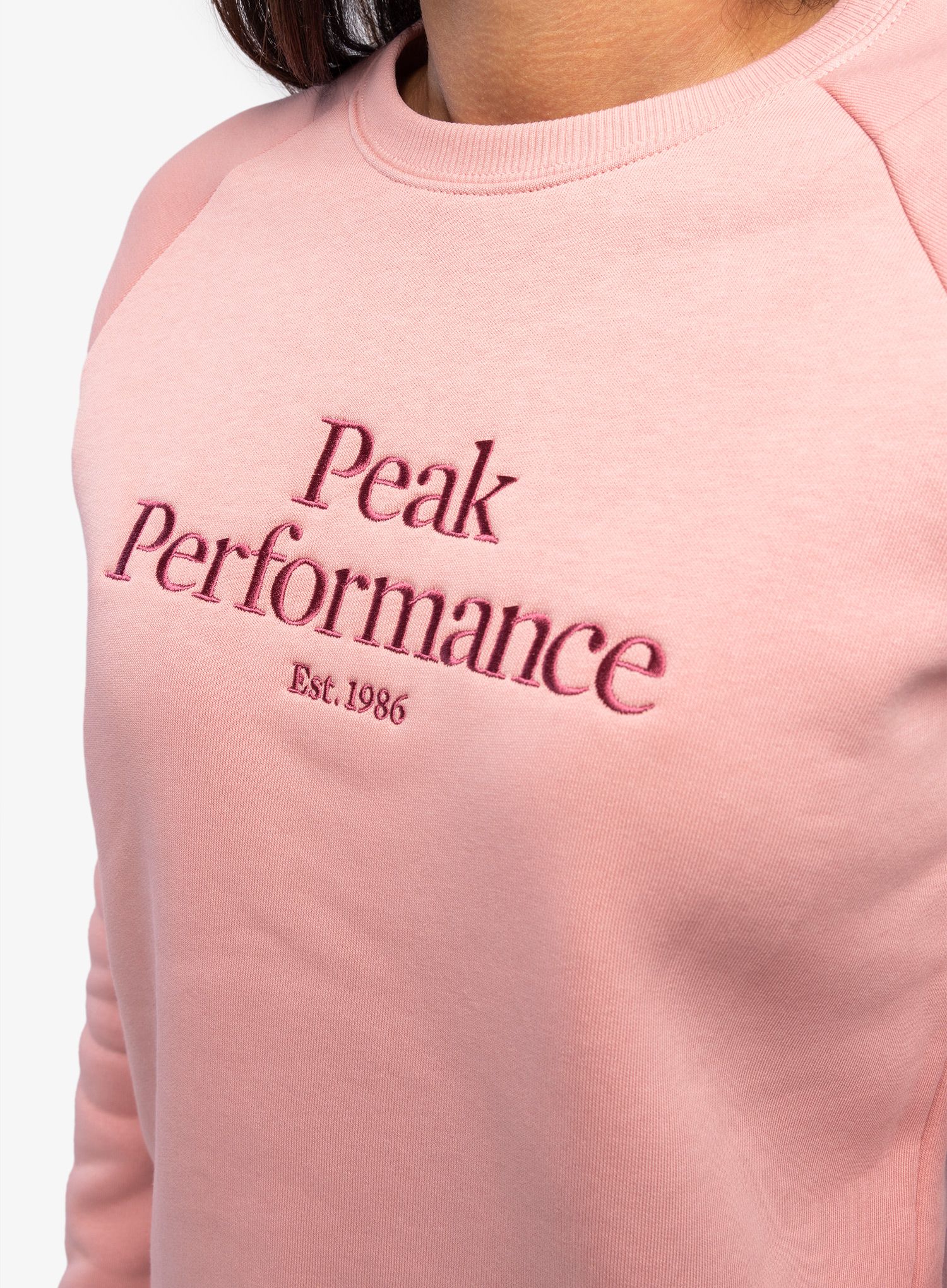 Jopica brez kapuce ženska Peak Performance Original Crew - warm blush