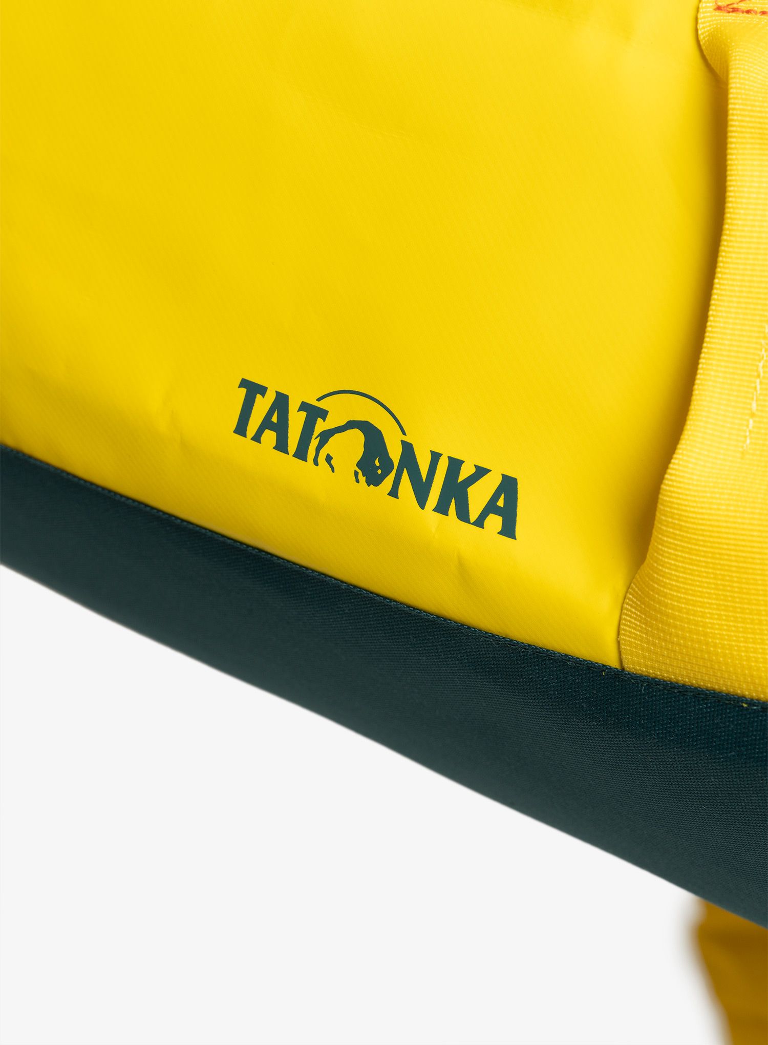 Potovalna torba Tatonka Barrel L - solid yellow