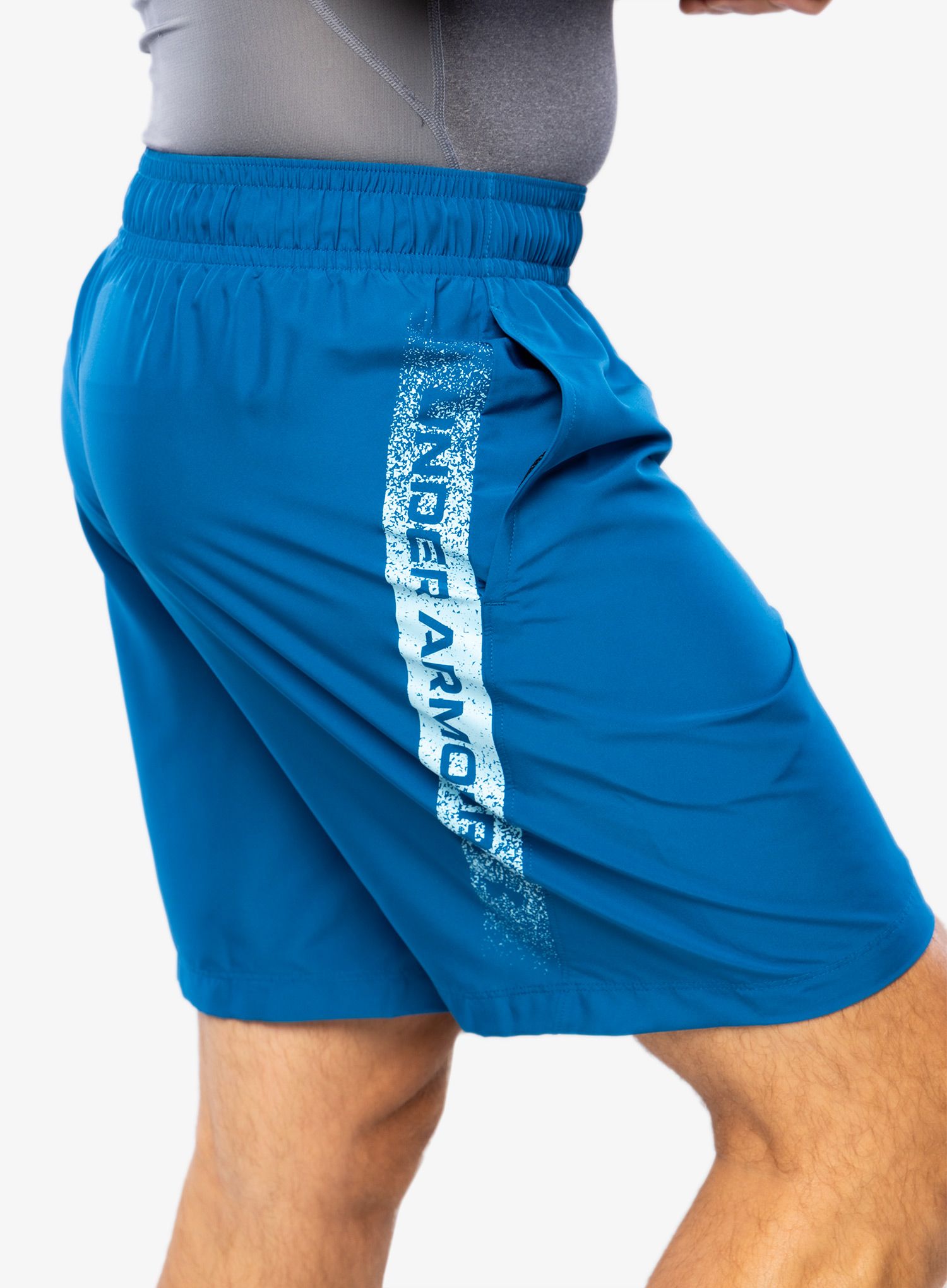 Športne kratke hlače Under Armour Woven Graphic Shorts - varsity blue/blizzard