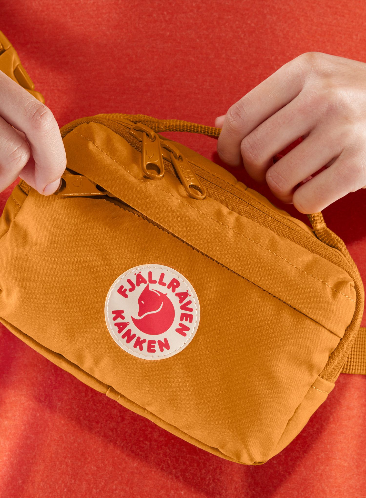 Torbica za čez ramo Fjallraven Kanken Hip Pack - spicy orange